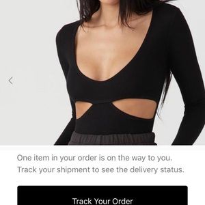 Cut out shirt in white never worn.